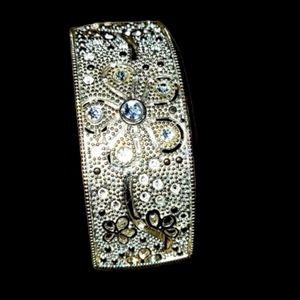 Soft yellow silver, rhinestone studded hair barrette